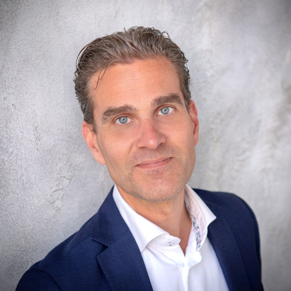 Portretfoto van Remco Coppejans, Partner bij Orange Team